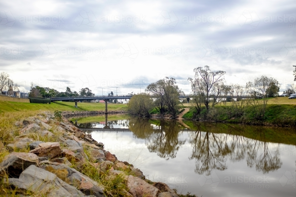 Levee bank and bridge over Maitland hunter river - Australian Stock Image