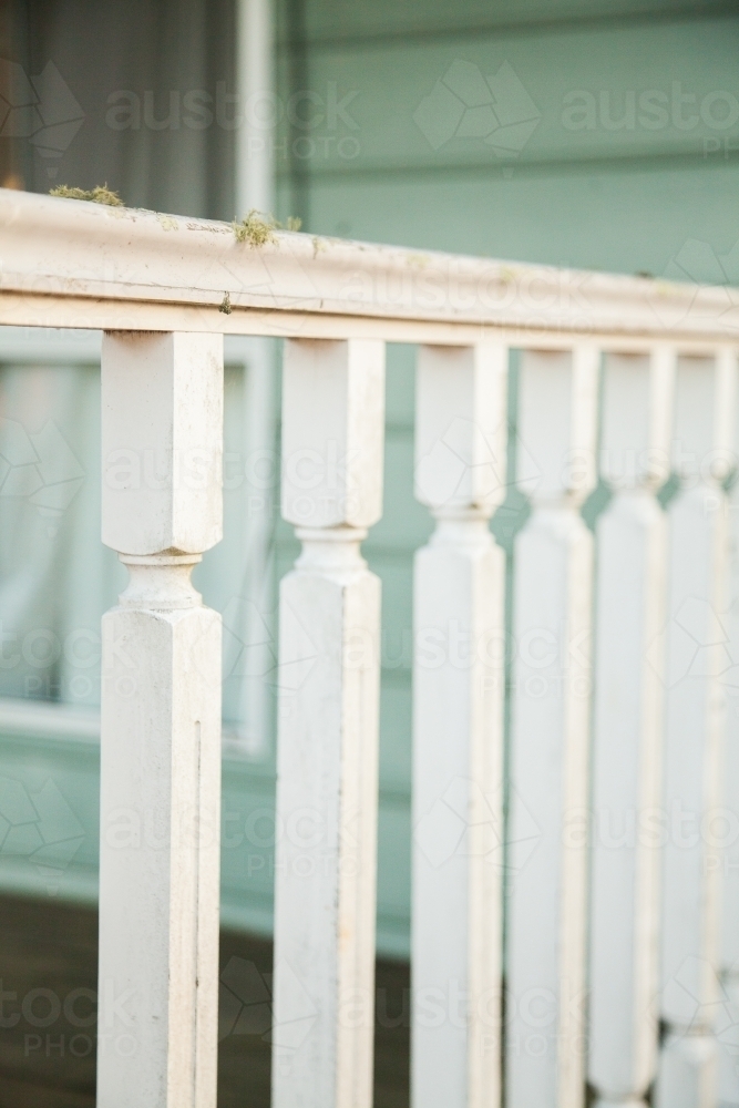 Lichen growing on white verandah railing - Australian Stock Image