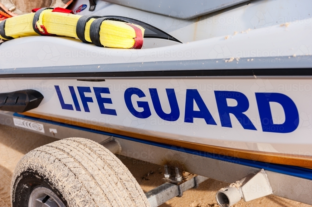 life guard rubber ducky on trailer at beach - Australian Stock Image