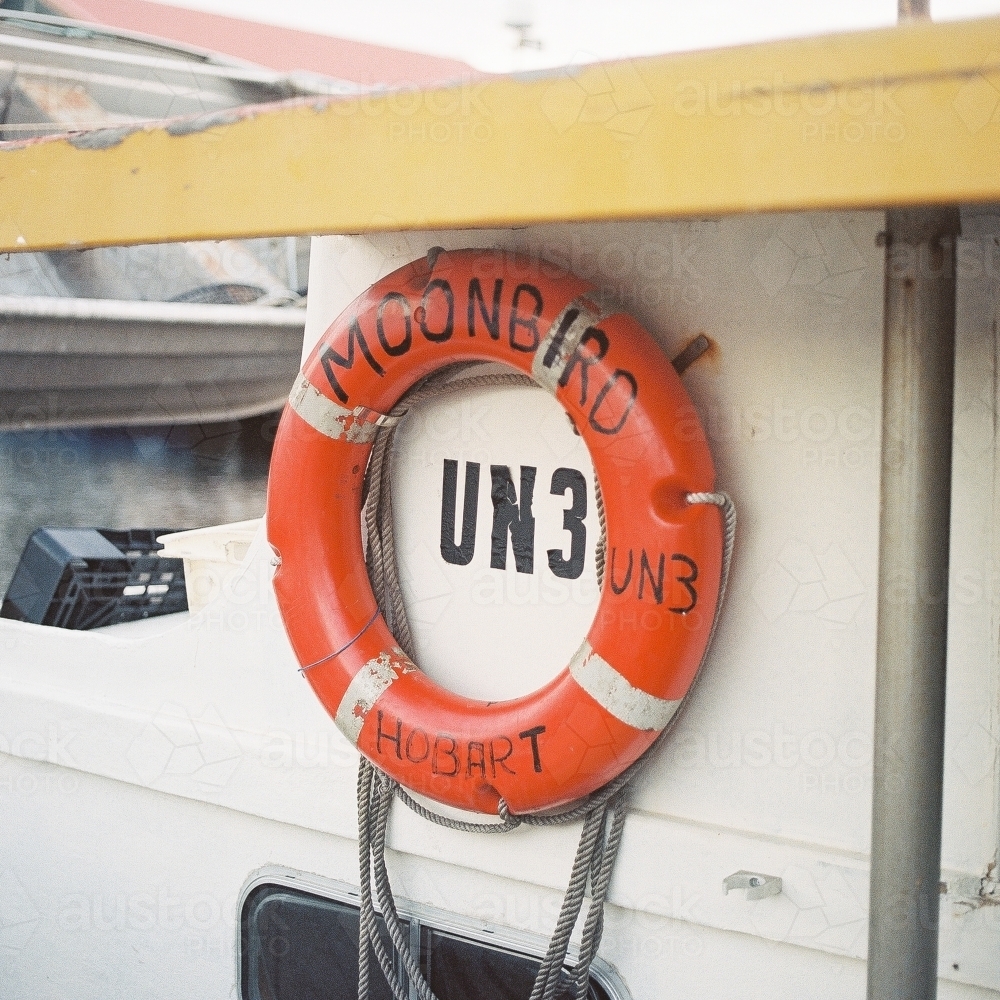Life Raft Ring on Small Fishing Boat - Australian Stock Image