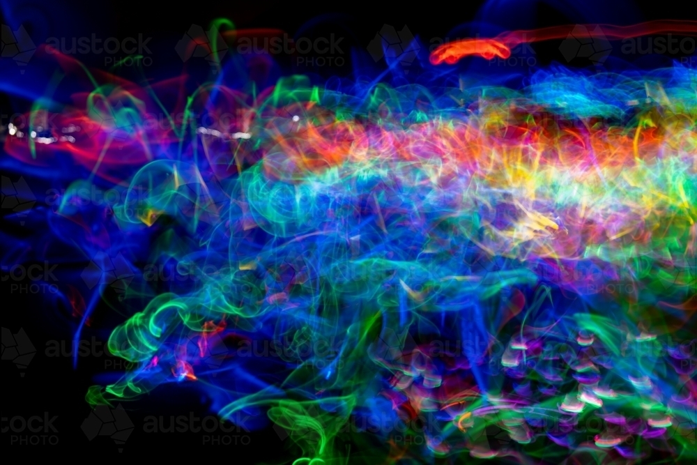 Light motion blur with glow sticks - Australian Stock Image