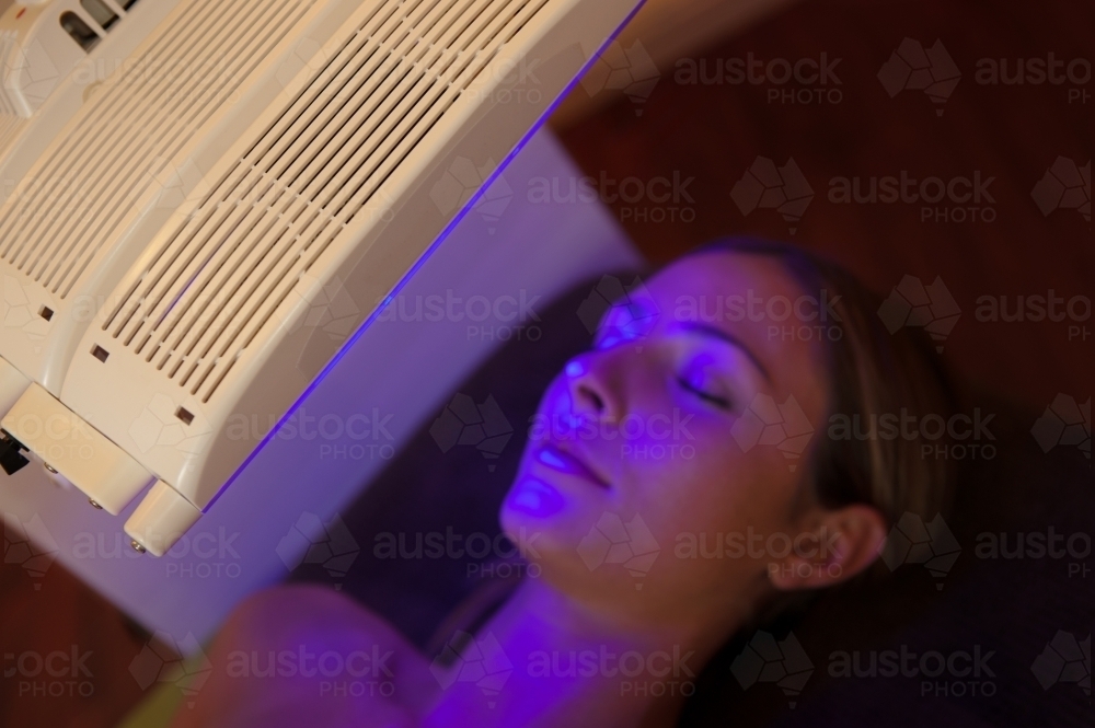 light therapy session, blue light for acne - Australian Stock Image