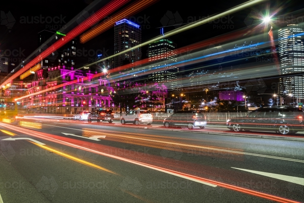 Light trails of city bus long exposure - Australian Stock Image
