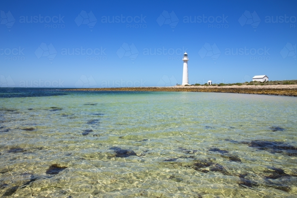 Lighthouse on a bay with blue sky - Australian Stock Image