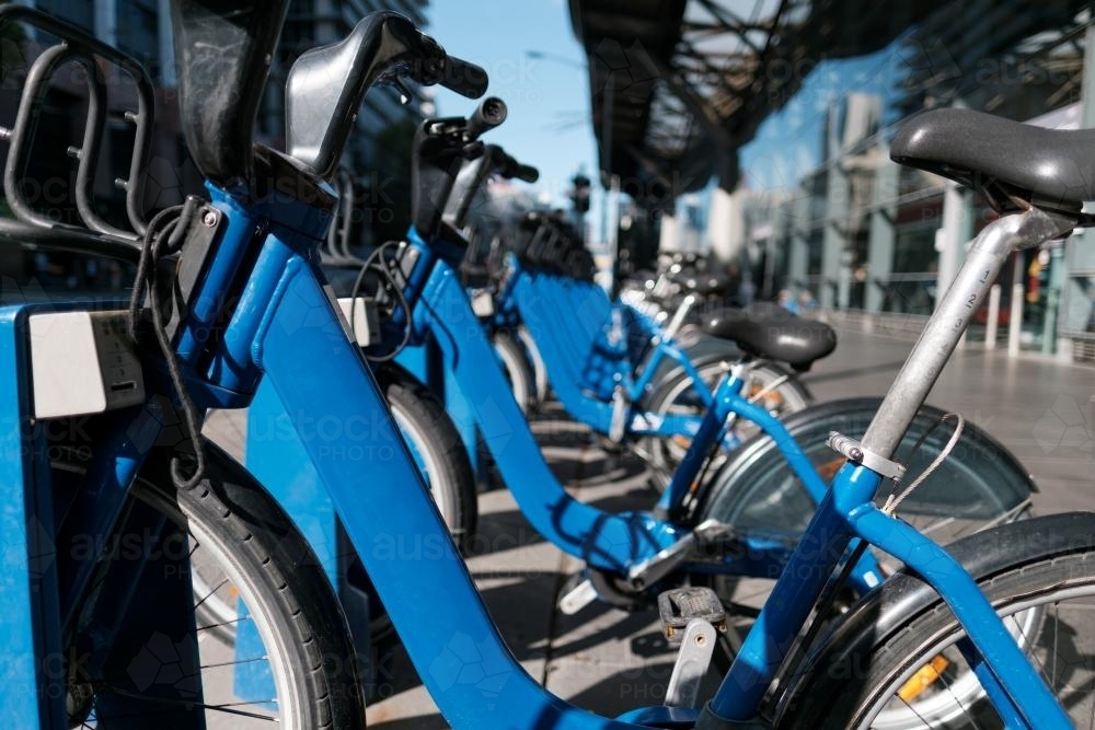 Line of Blue Bicycles outside Southern Cross Station - Australian Stock Image