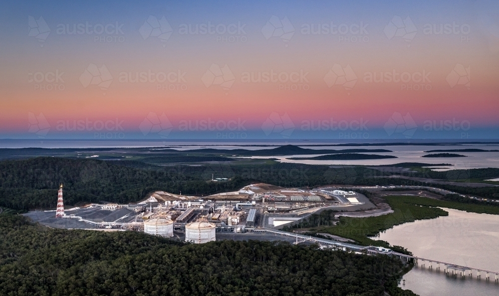 Liquified natural gas plant (LNG) on Curtis Island with the coral sea in the background - Australian Stock Image