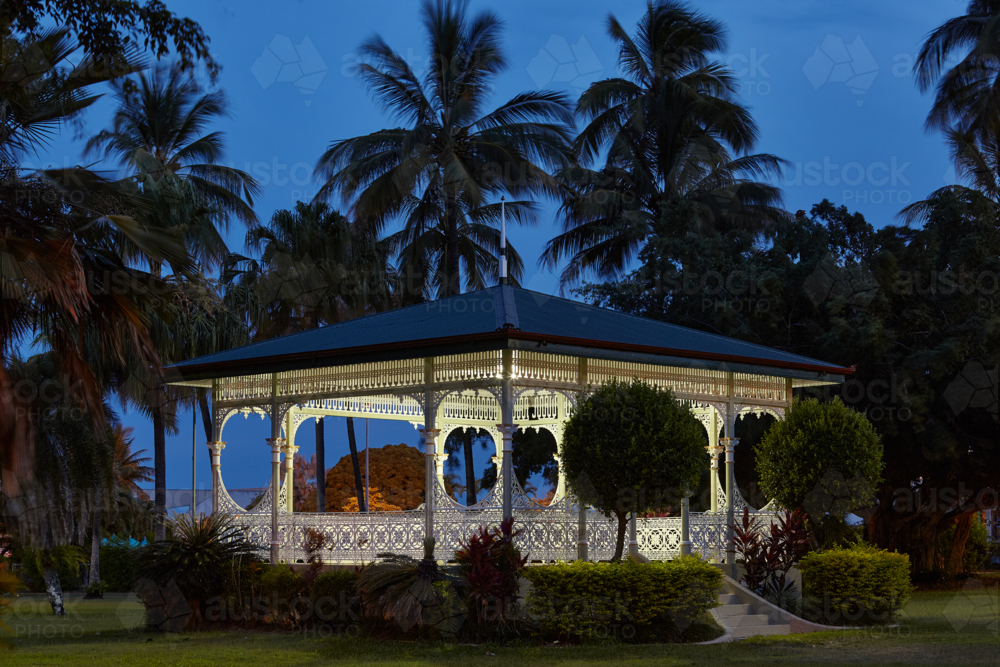 Lit heritage rotunda in park at dusk. - Australian Stock Image