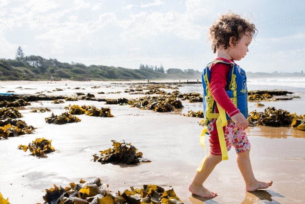 Little girl at beach - Australian Stock Image