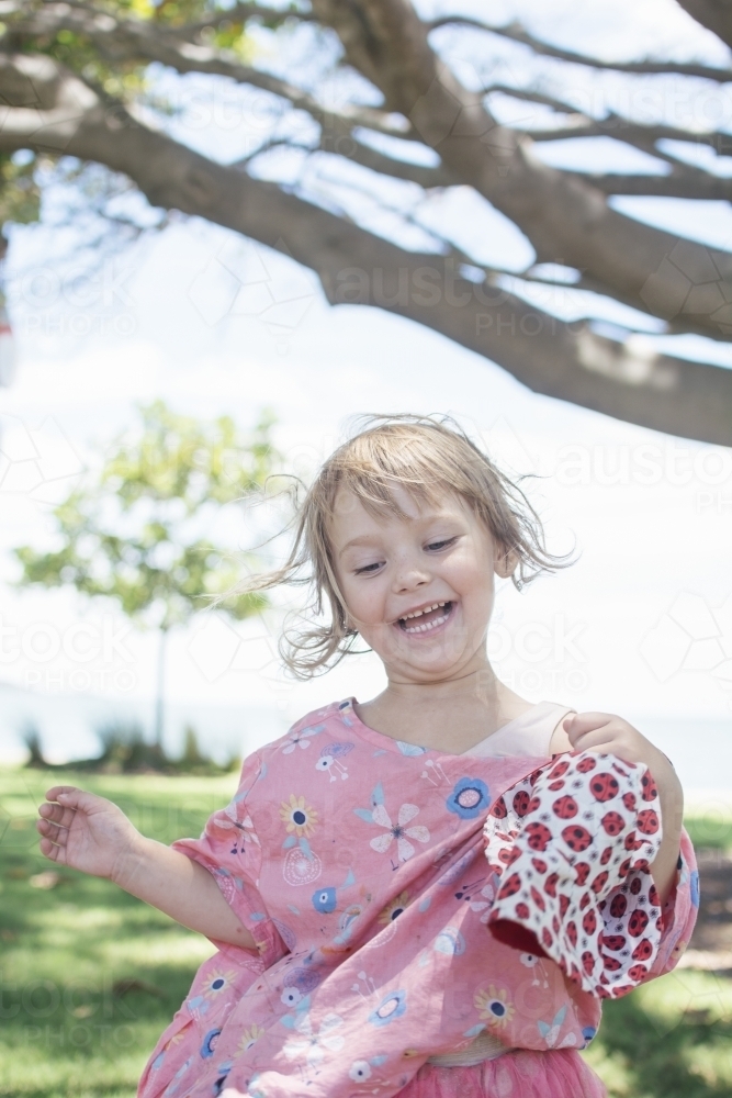 Little girl laughing - Australian Stock Image
