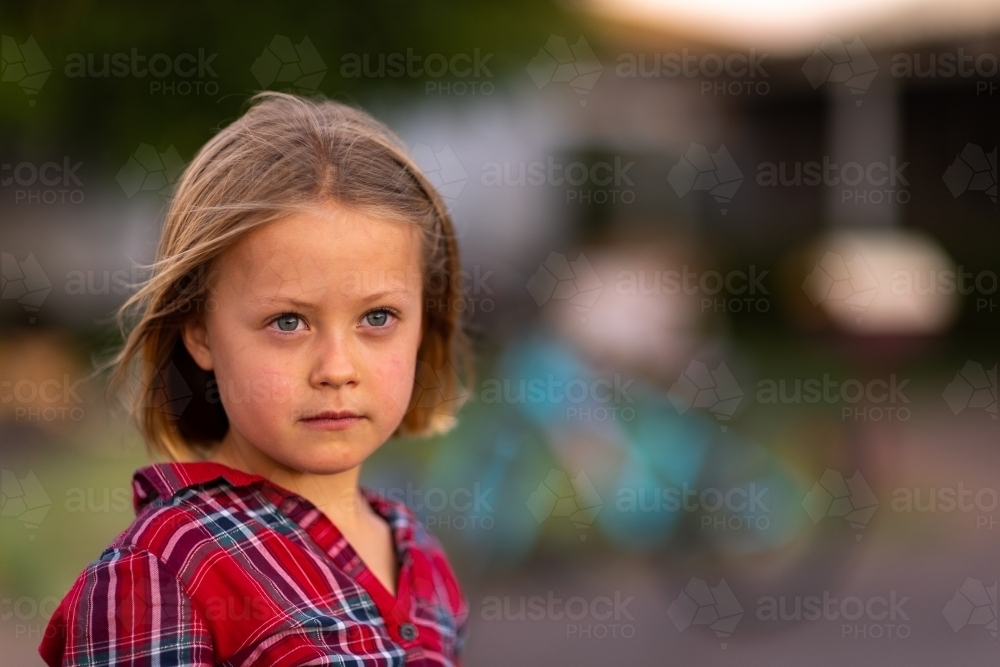 little girl looking intently into distance - Australian Stock Image