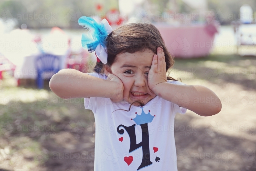 Little girl making faces - Australian Stock Image