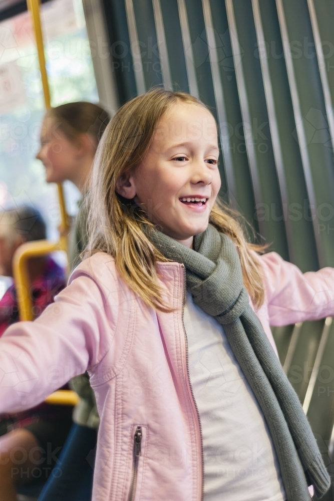 little girl on a tram in Adelaide - Australian Stock Image