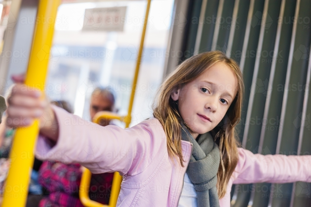 little girl on a tram in Adelaide - Australian Stock Image
