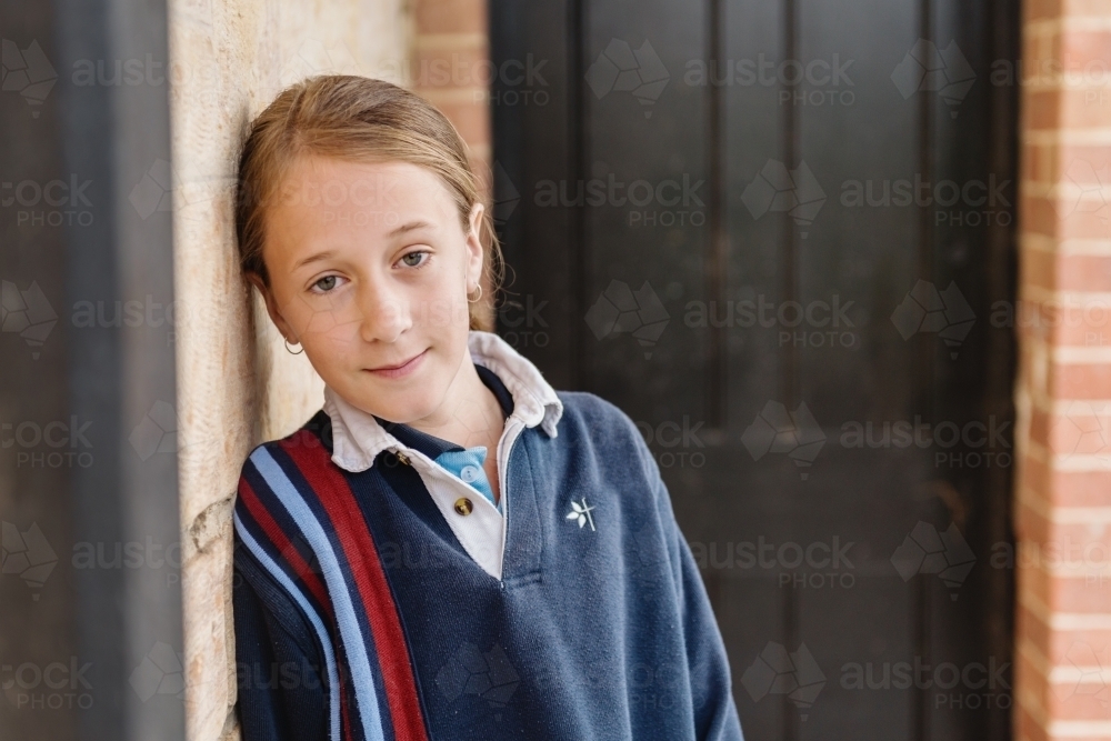 little girl on her first day of high school, grade 7 - Australian Stock Image