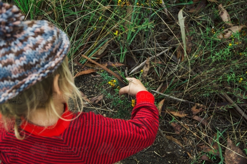 Little girl playing outside - Australian Stock Image