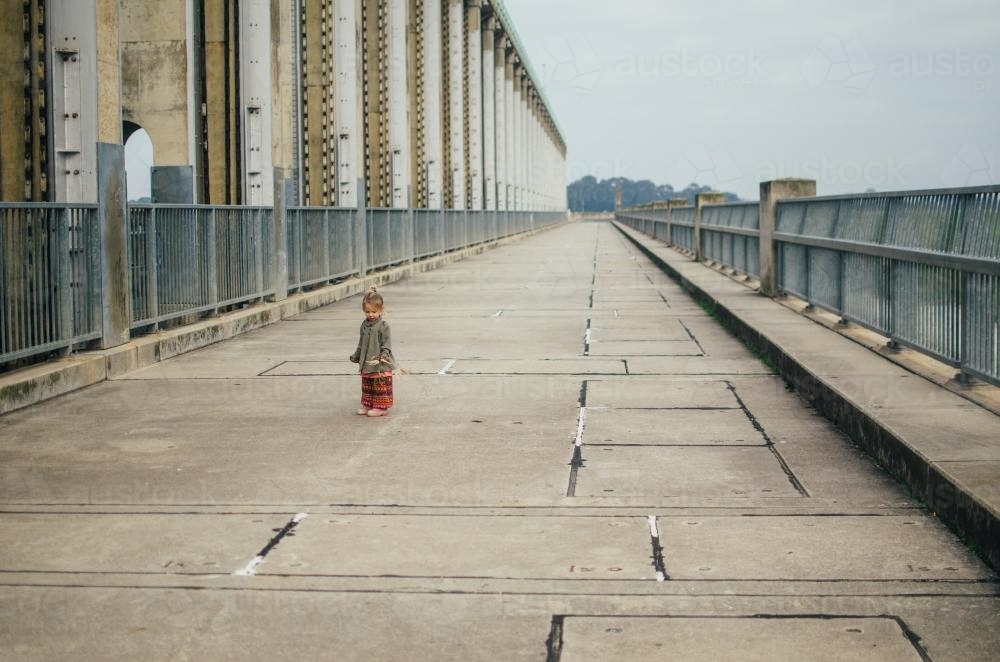 Little girl standing on Hume Dam - Australian Stock Image