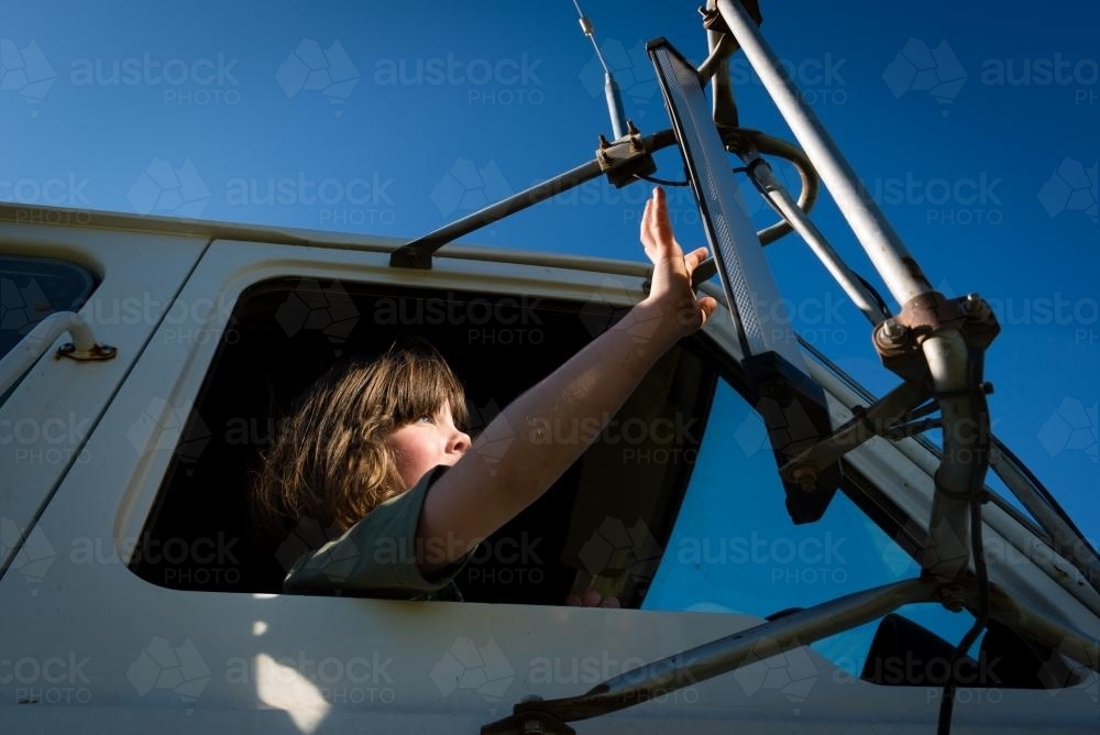 Little girl waiting in a truck - Australian Stock Image