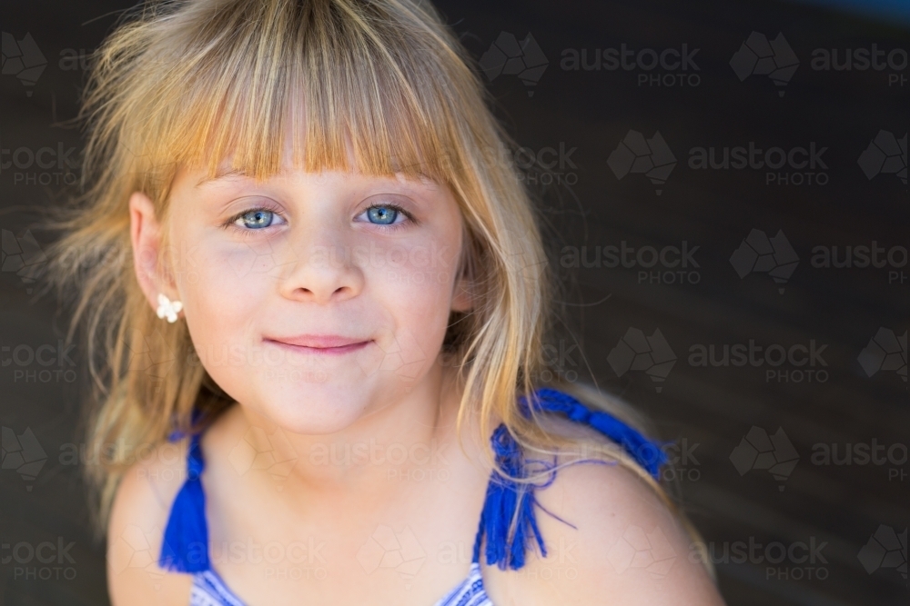 Little girl with crooked haircut and a fringe - Australian Stock Image