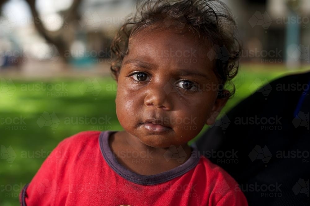 Little Indigenous Australian Girl with a Red Top - Australian Stock Image
