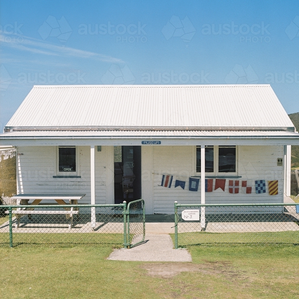 Little White Cottage on Island - Australian Stock Image