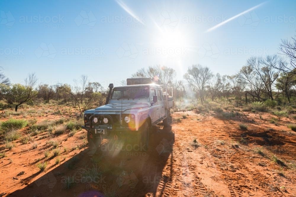 Loaded up four wheel drive traveling through Outback Australia - Australian Stock Image
