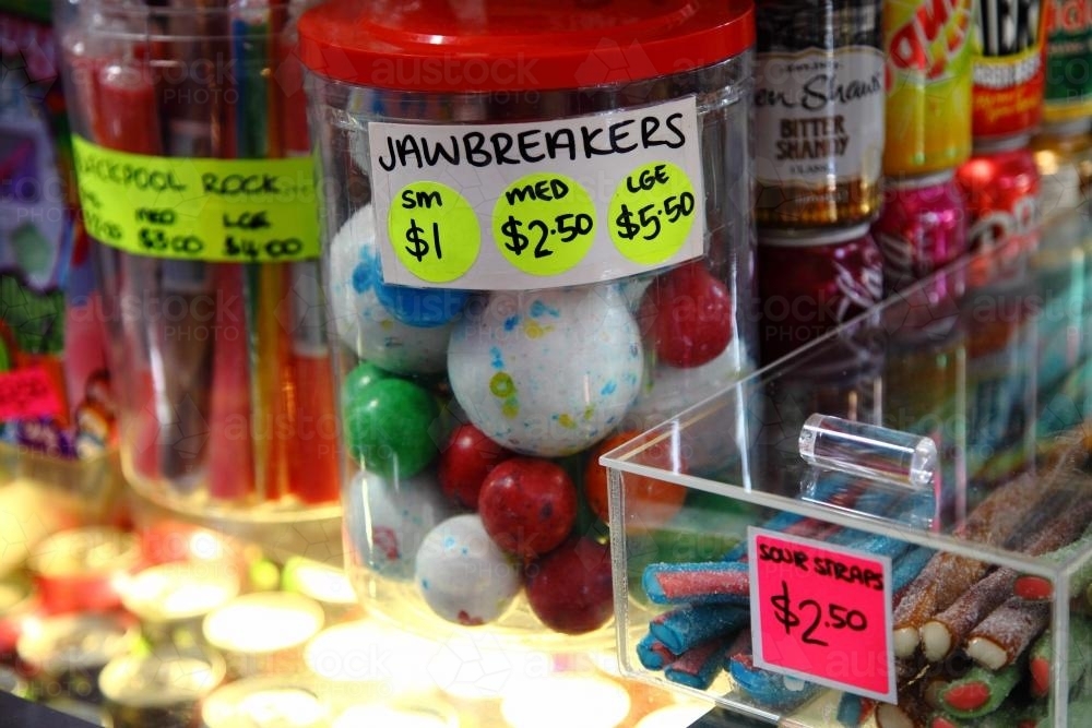 Lollies in priced containers - Australian Stock Image