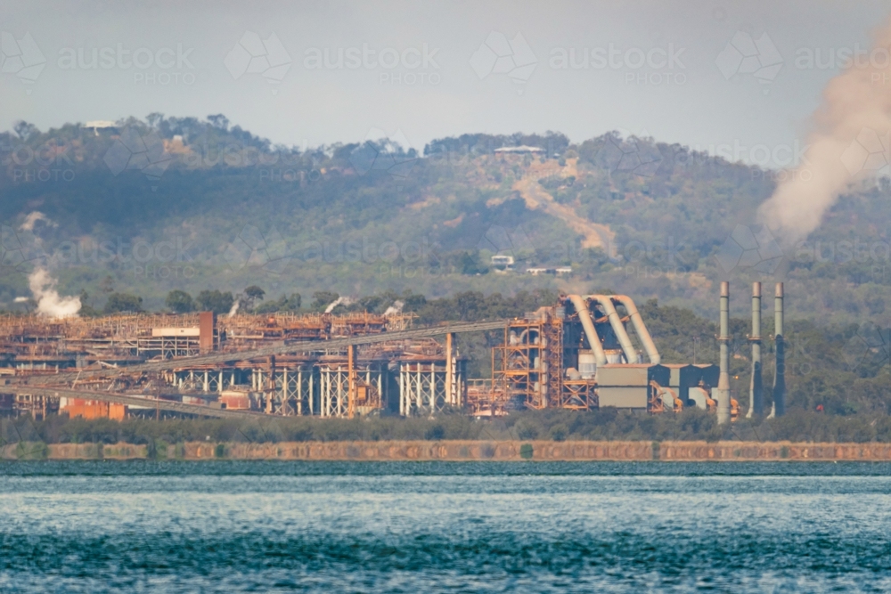 Long distance view of an industrial site near Gladstone - Australian Stock Image
