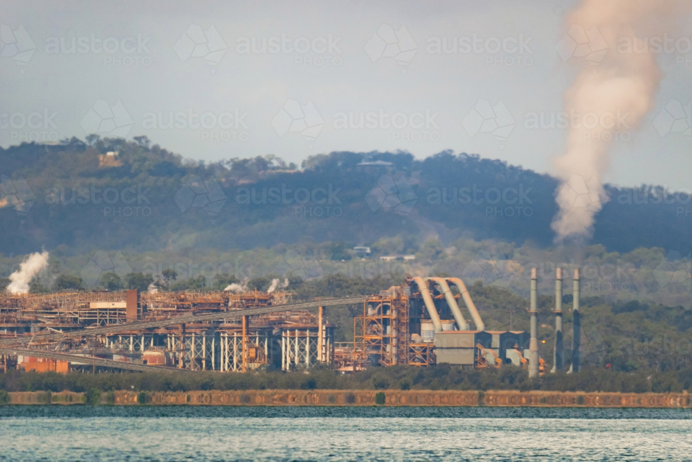 Long distance view of an industrial site near Gladstone - Australian Stock Image
