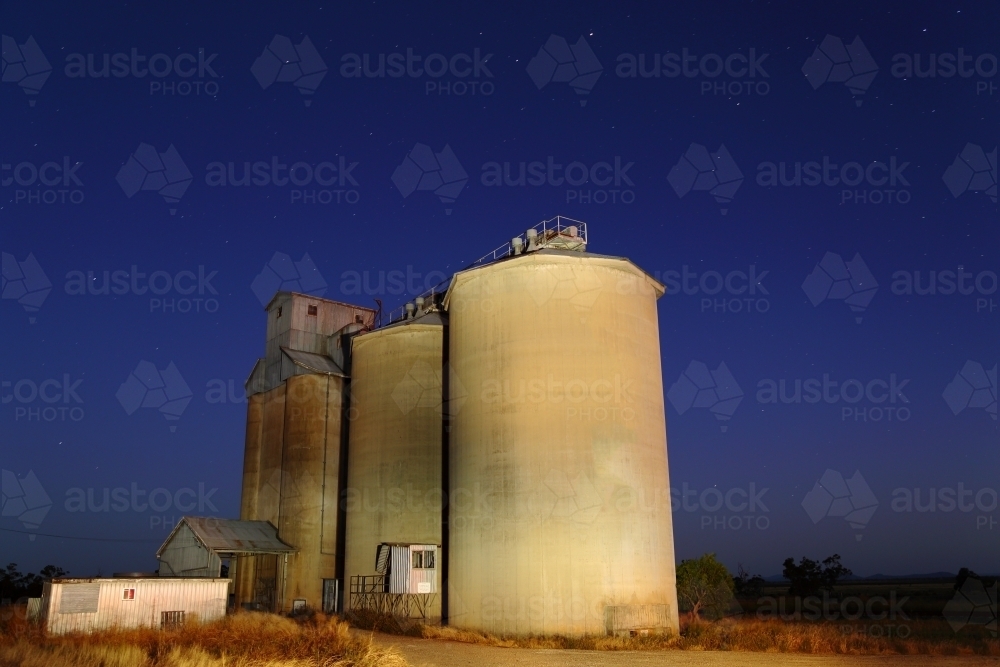 Long exposure light painting of grain silos at Breeza on the Liverpool Plains - Australian Stock Image