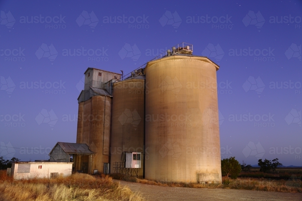 Long exposure light painting of grain silos at Breeza on the Liverpool Plains - Australian Stock Image