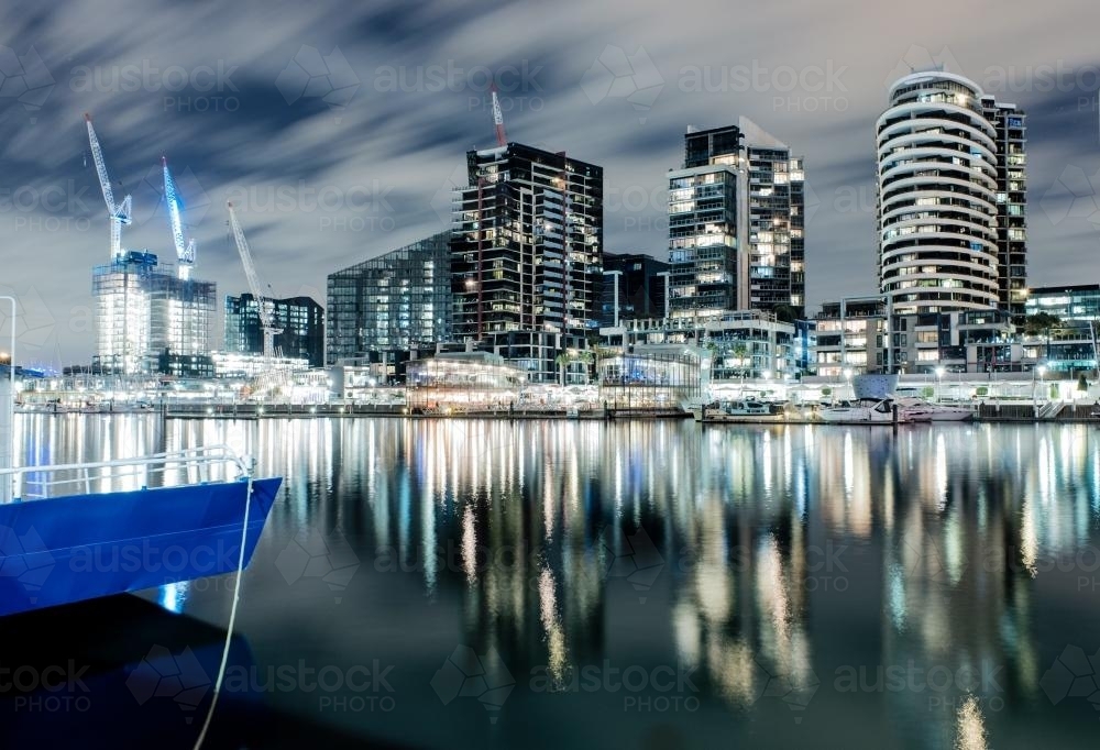 Long exposure of docklands and lights of city buildings at night - Australian Stock Image