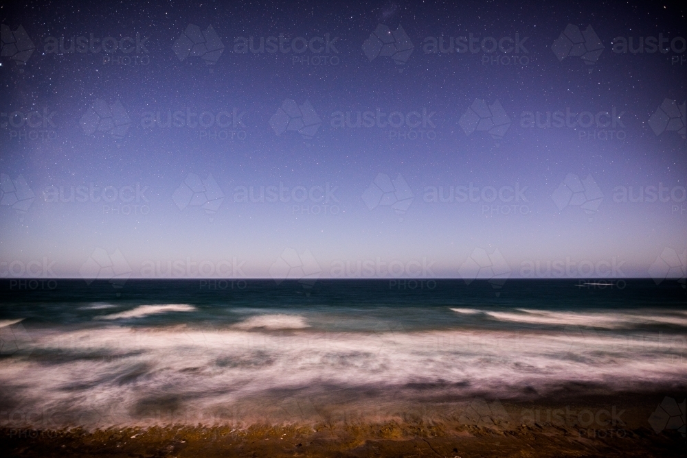 Long exposure of the beach at night - Australian Stock Image