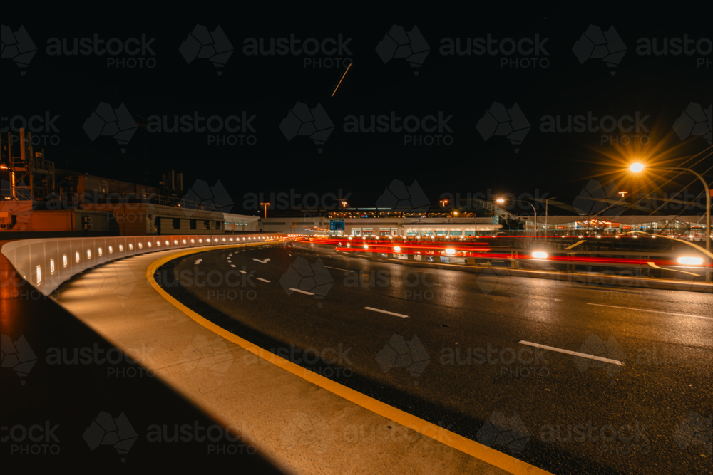 Long exposure shot of night time traffic at Sydney Domestic Airport - Australian Stock Image