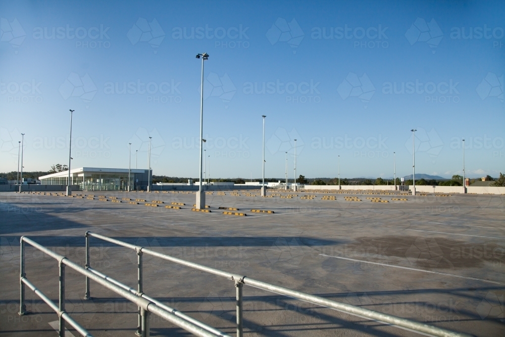 Long shadows in empty car park - Australian Stock Image