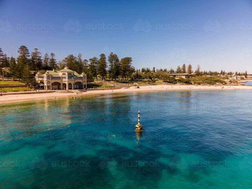 Looking across the water back toward the Indiana Tea House on Cottesloe Beach - Australian Stock Image