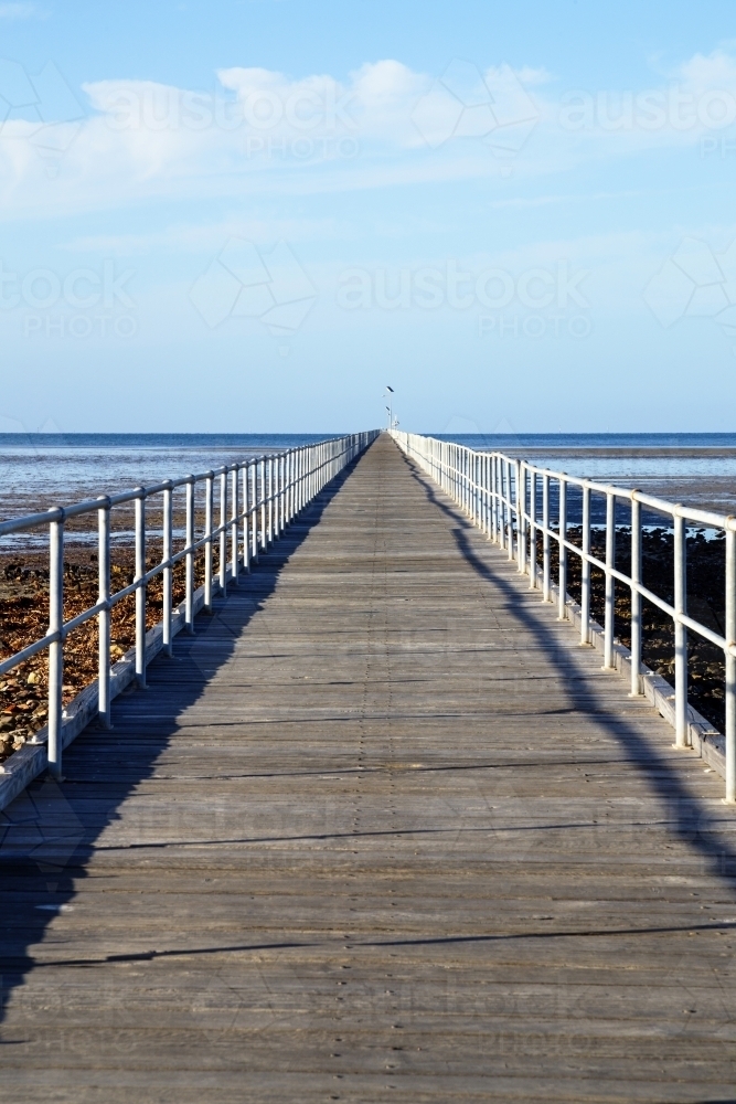 looking along jetty - high angle vertical - Australian Stock Image