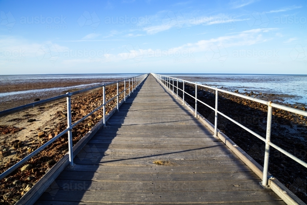 Looking along jetty - horizontal high angle - Australian Stock Image