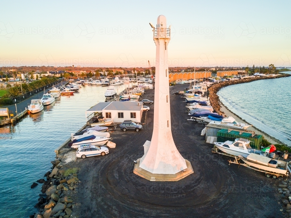 Looking down at the St Kilda Lighthouse and boats marked at the marina - Australian Stock Image