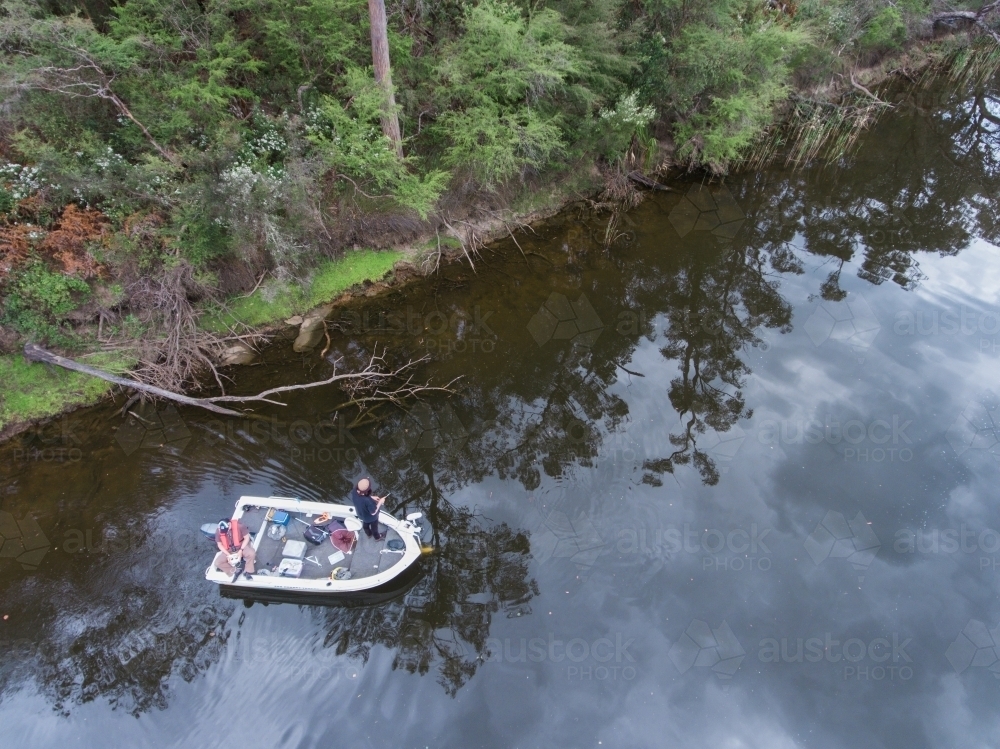 Looking down at Two Fishermen in a  Boat - Australian Stock Image