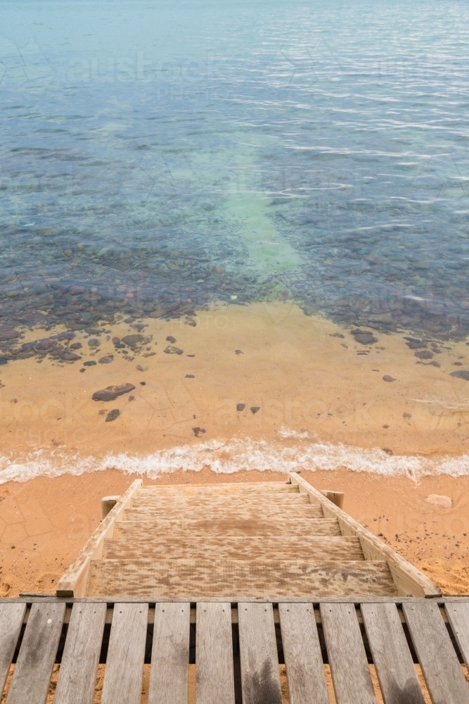 looking down into the ocean from a beach hut, Mt Martha, Victoria, Australia - Australian Stock Image