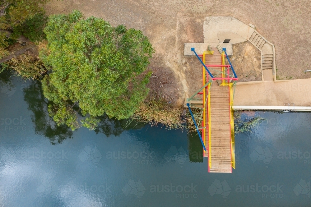Looking down on a double level diving platform over a lake - Australian Stock Image