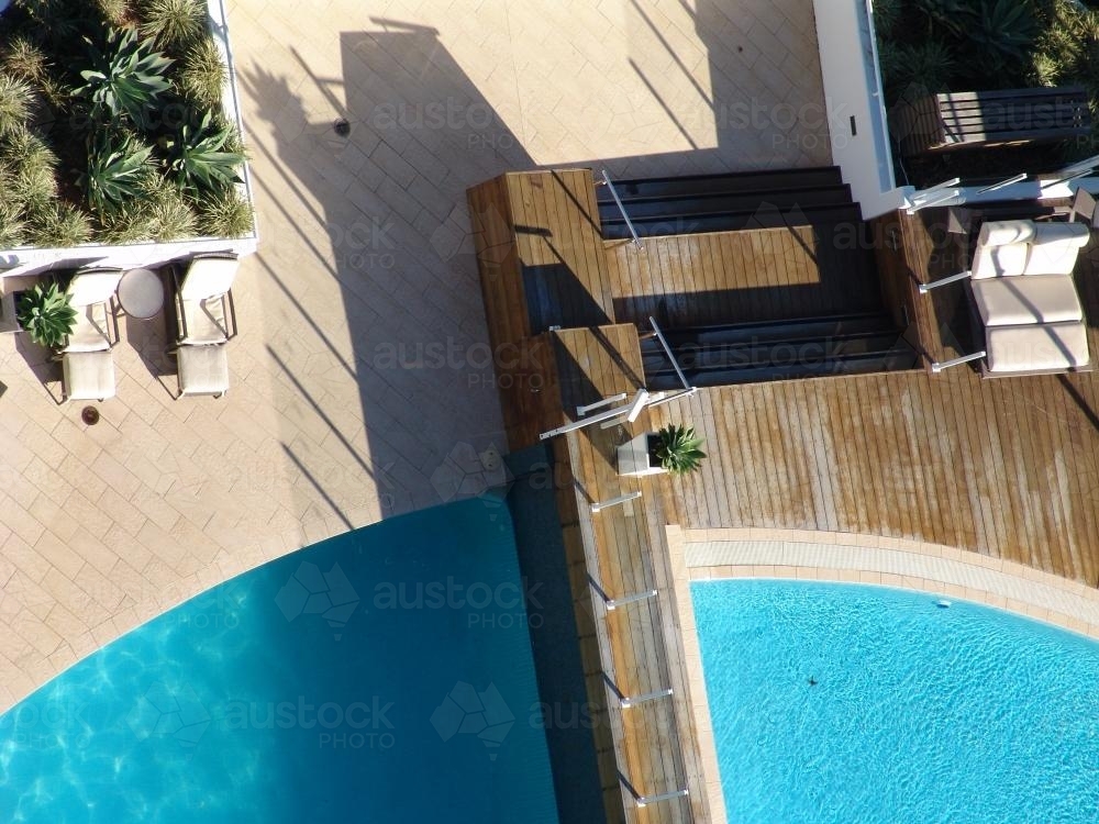Looking down on a swimming pool complex - Australian Stock Image
