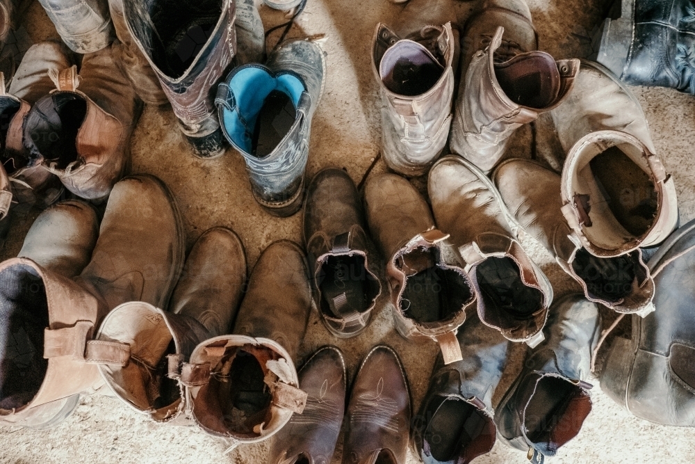 Looking down on a whole lot of riding boots. - Australian Stock Image
