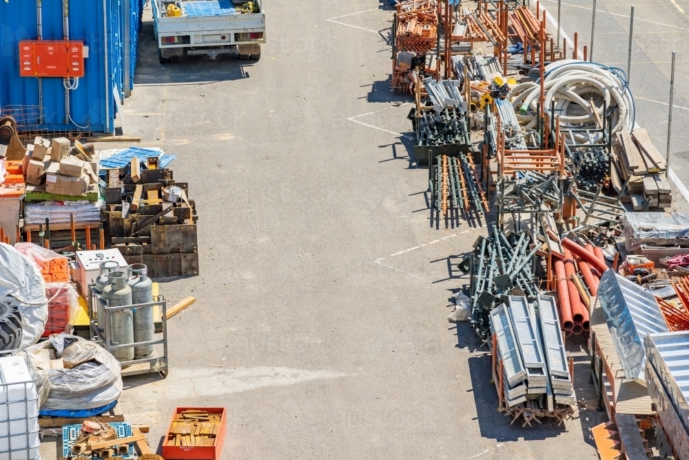 Image of Looking down on construction yard stacked with building ...
