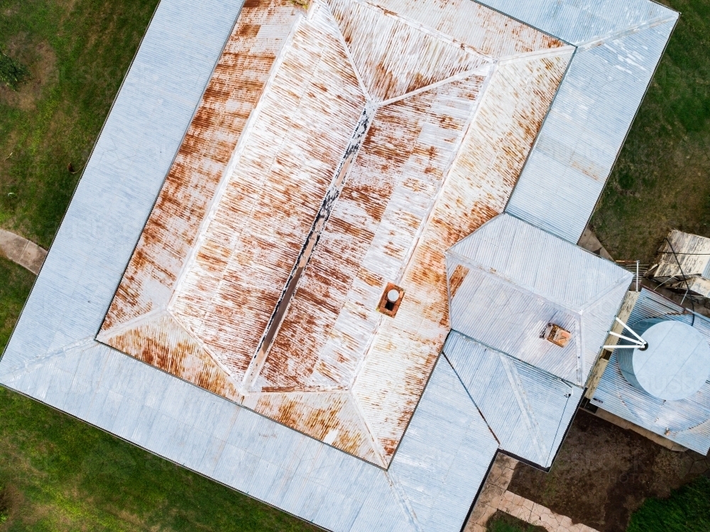 looking down on the roof of a farmhouse homestead building - Australian Stock Image