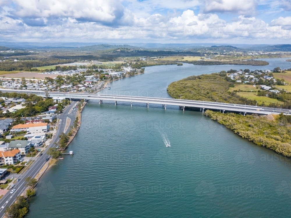 Looking down over a bridge crossing the Maroochy River - Australian Stock Image
