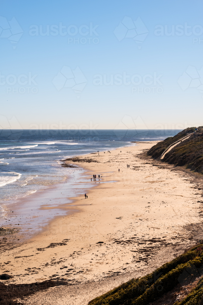 Looking down towards of people on beach, Seaford Beach, South Australia - Australian Stock Image