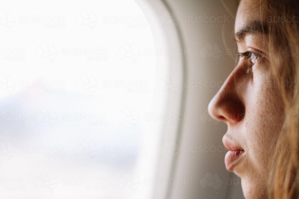 Looking out of airplane window - Australian Stock Image