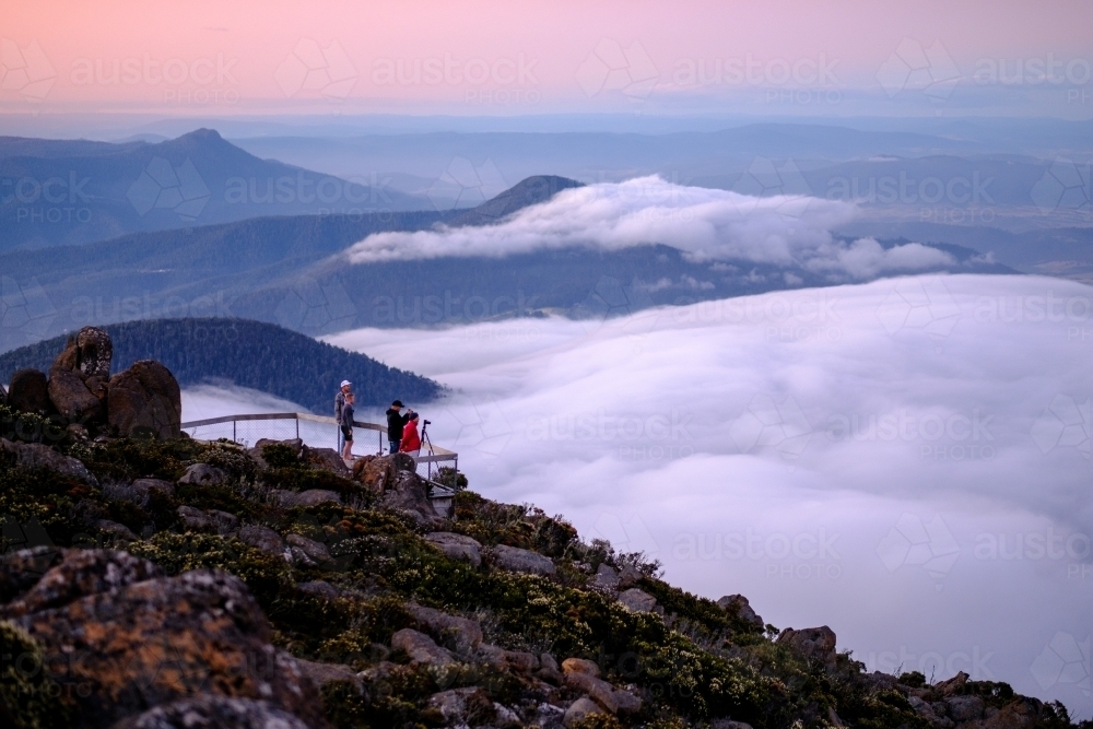 Looking out over Low Lying Clouds above Hobart from Mt Wellington - Australian Stock Image