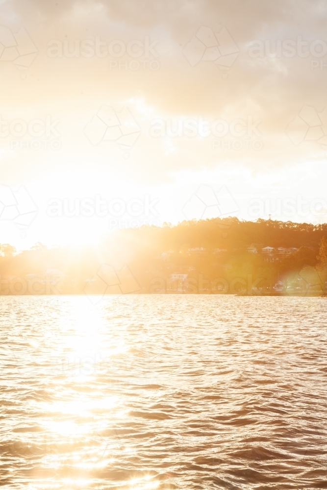 Looking out over sunlit water of Lake Macquarie at Warners Bay - Australian Stock Image